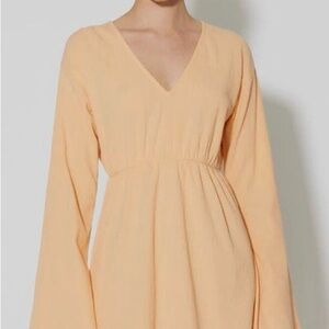 Elegant Peach V-Neck Dress